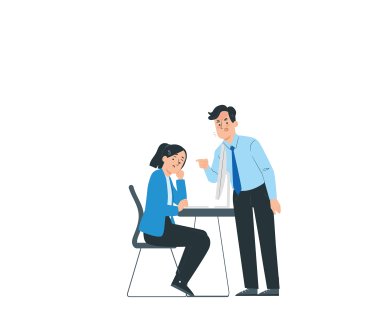 Ein Mitarbeiter schimpft mit einer Mitarbeiterin und droht ihr mit dem Zeigefinger.